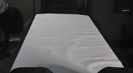 Relaxing treatment table at Precision Lifestyle Group, Manchester, England, GB, ready for a tranquil wellness session.