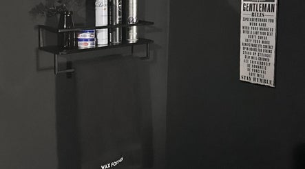 Stylish grooming station at Precision Lifestyle Group, Manchester, England, GB featuring products and gentleman rules decor.