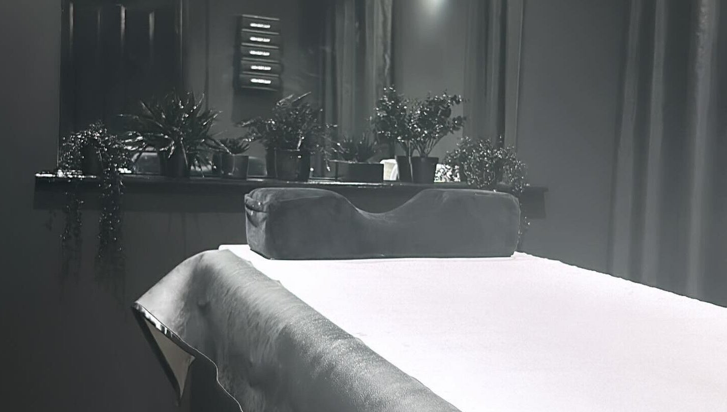 Relaxing treatment room setup with plants at Please Book at Wax for Men co uk, Manchester, England, GB.