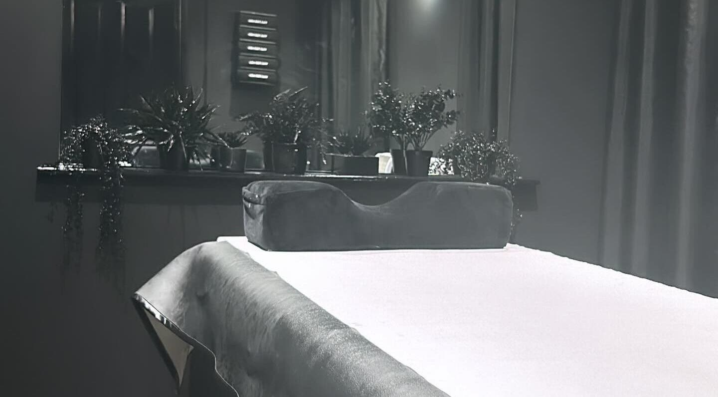 Relaxing treatment room setup with plants at Please Book at Wax for Men co uk, Manchester, England, GB.