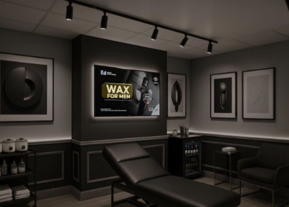 Modern spa room at Please Book at Wax for Men co uk, Manchester, England, GB with sleek decor and treatment bed.