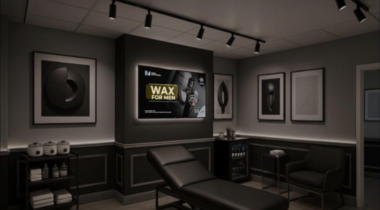 Modern spa room at Please Book at Wax for Men co uk, Manchester, England, GB with sleek decor and treatment bed.
