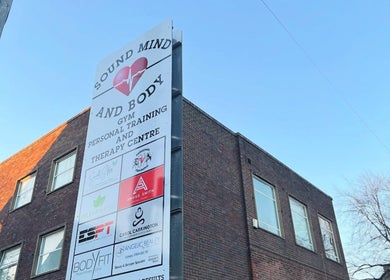 Beauty Custom Club Massage Studio exterior in Benton, England, GB with a prominent neighborhood sign.