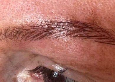 Close-up of expertly shaped eyebrows at Beauty Custom Club Massage Studio, Benton, England, GB.