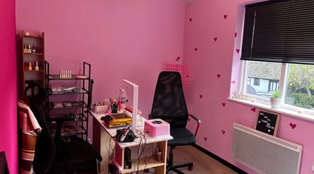 Chic pink nail studio at Nail-Licious by Emilia, Godmanchester, England, GB with cozy decor.