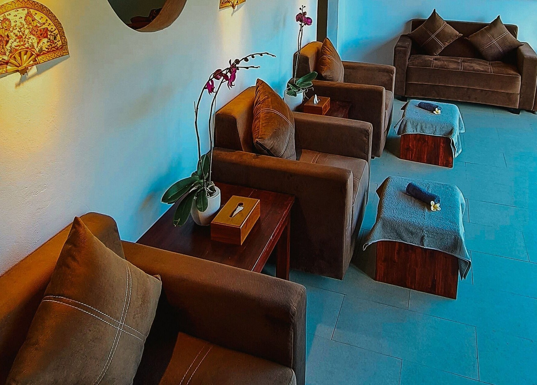 Relaxing seating area at Sarira Healing Spa, Bali, Bali, ID, featuring plush chairs and soothing decor.