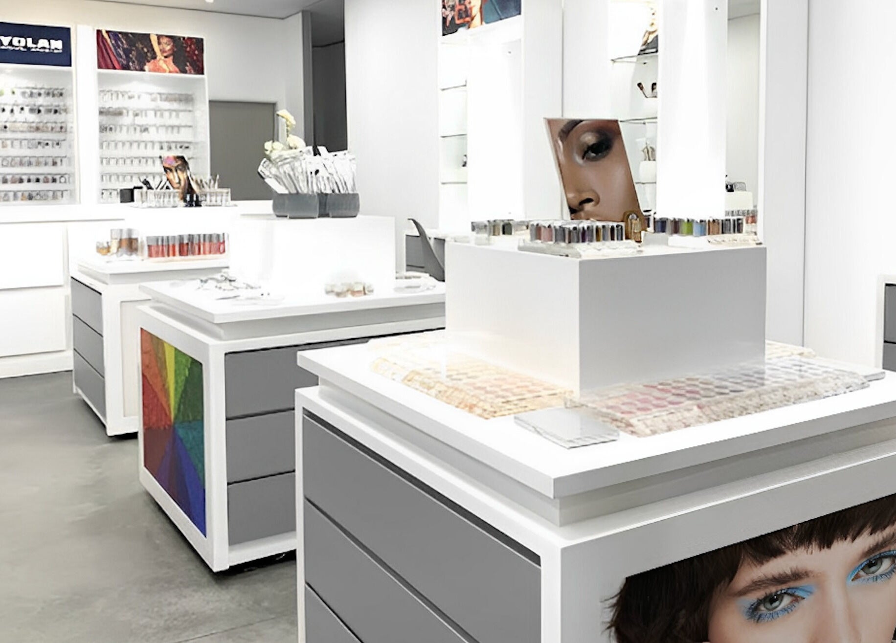 Modern interior of Kryolan Silver Lakes in Shere, Gauteng, ZA showcasing sleek white displays and cosmetics.