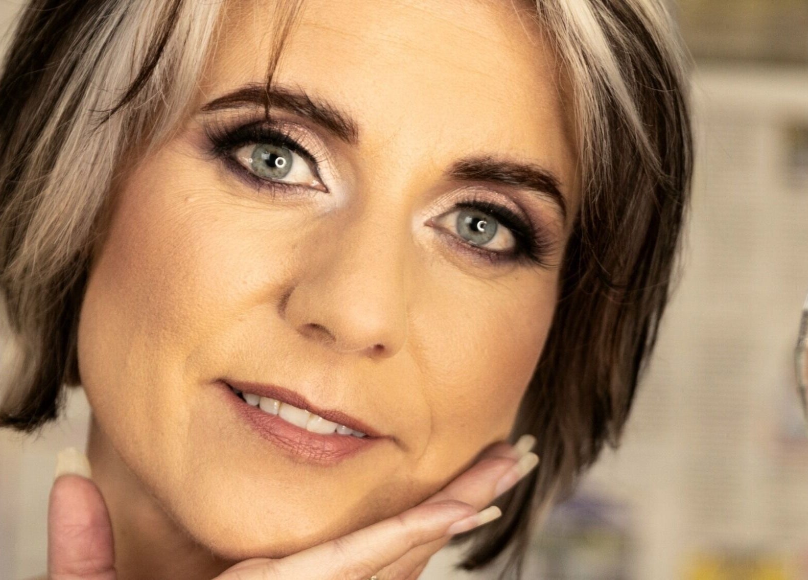 Close-up of a woman's face showcasing makeup at Kryolan Silver Lakes, Shere, Gauteng, ZA.