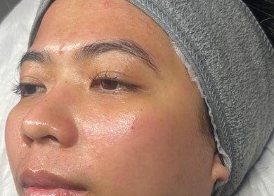 Glowing skin facial at Refresh Skin Therapy, Southampton, England, GB. A serene face wrapped in a soft headband.