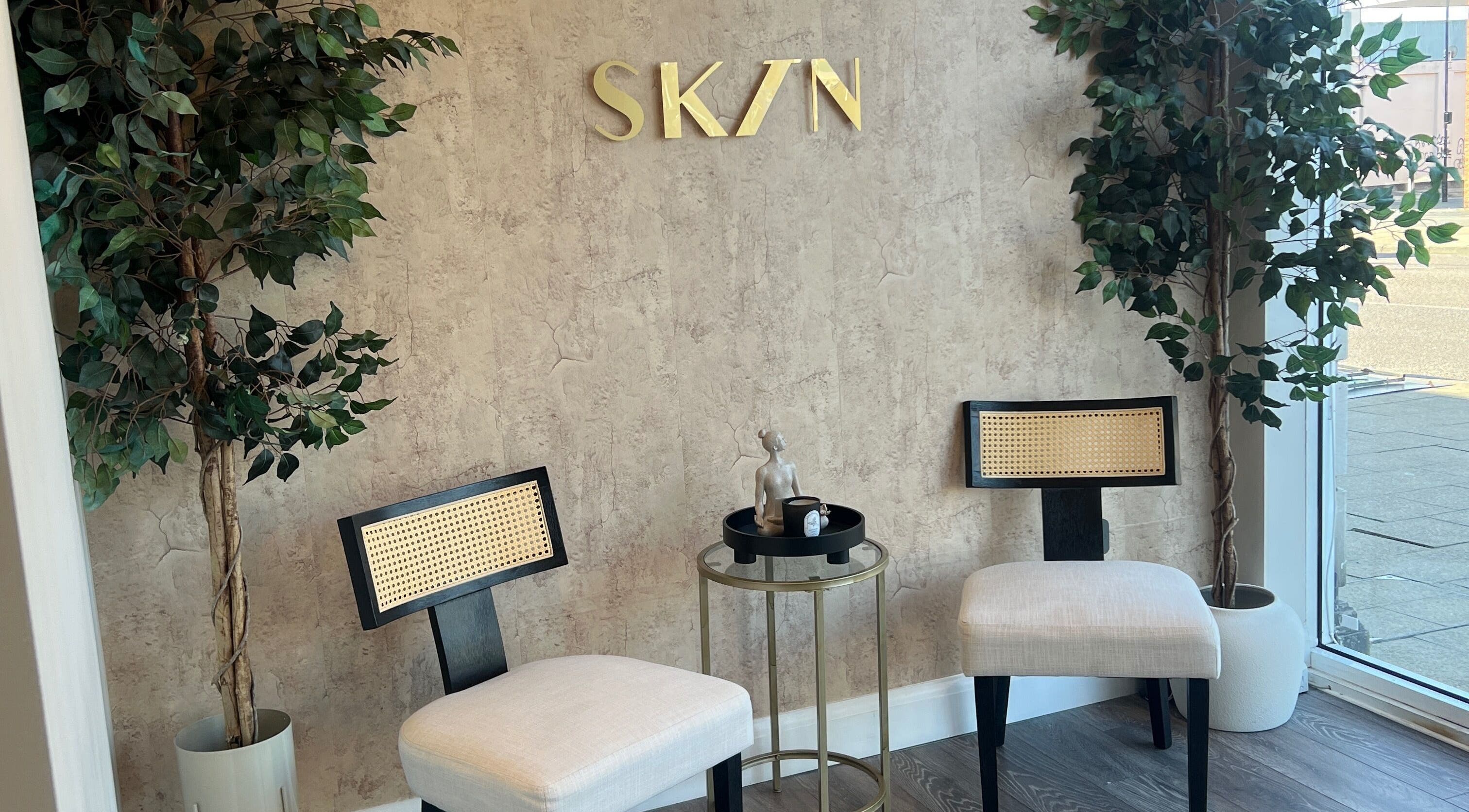 Calming lounge at Refresh Skin Therapy, Southampton, England, GB, featuring stylish chairs and serene decor.