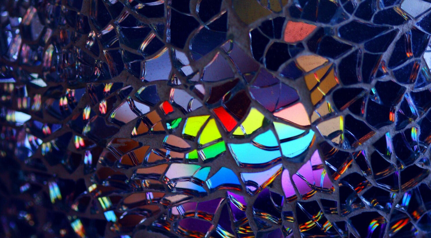 Colorful glass mosaic at Precision Pulse Electrolysis in Nashville, Tennessee, US enhances the serene atmosphere.