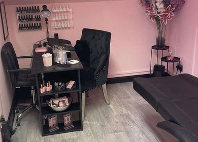 Elegant treatment room at The Skin Clinic By Nurse Tina in Tweedbank, Scotland, GB with manicure table and seating.