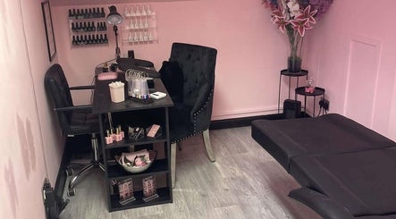 Elegant treatment room at The Skin Clinic By Nurse Tina in Tweedbank, Scotland, GB with manicure table and seating.