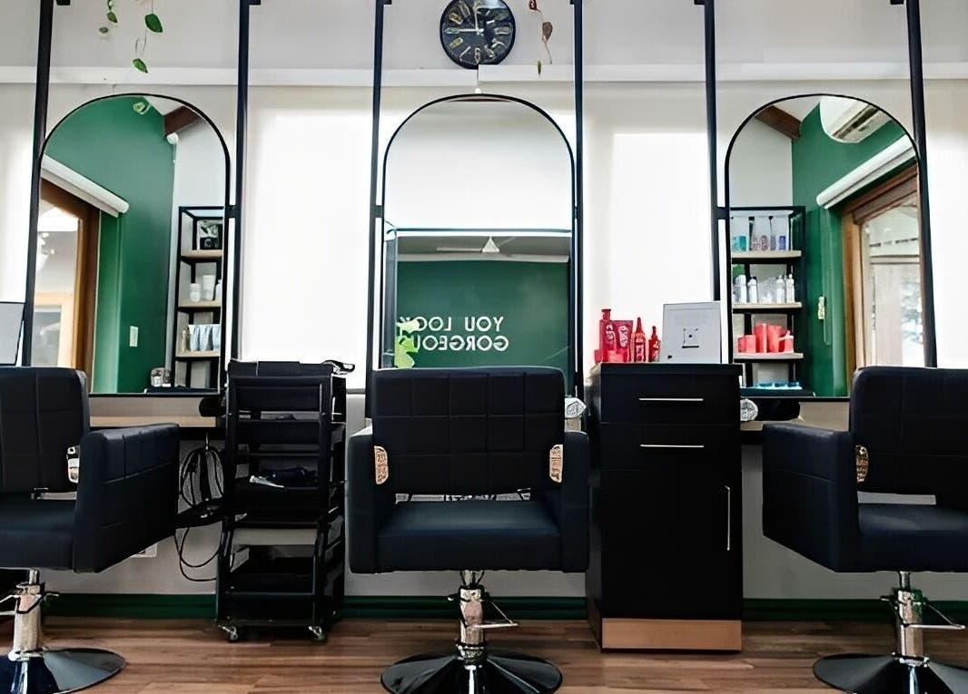 Modern salon chairs and mirrors at Hair By Caryn Timms, Pietermaritzburg, Kwazulu-natal, ZA.