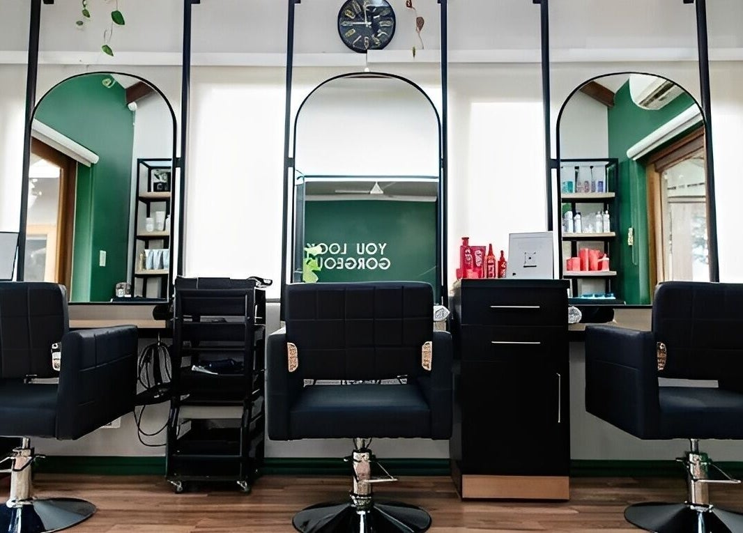 Modern salon chairs and mirrors at Hair By Caryn Timms, Pietermaritzburg, Kwazulu-natal, ZA.