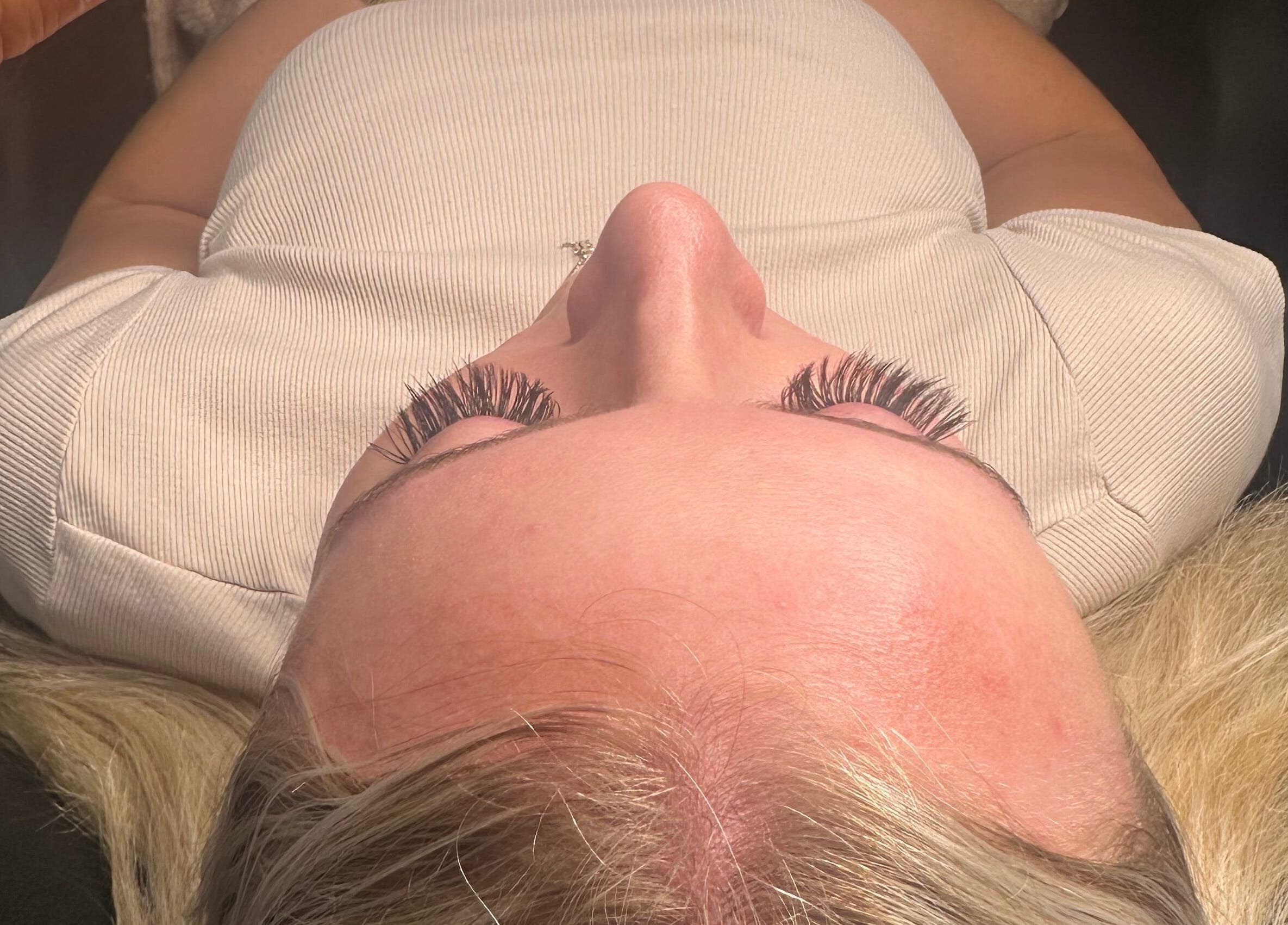 Client with enhanced eyelashes at KS Renewal Space, Hamilton, Waikato, NZ, showcasing beauty treatment.