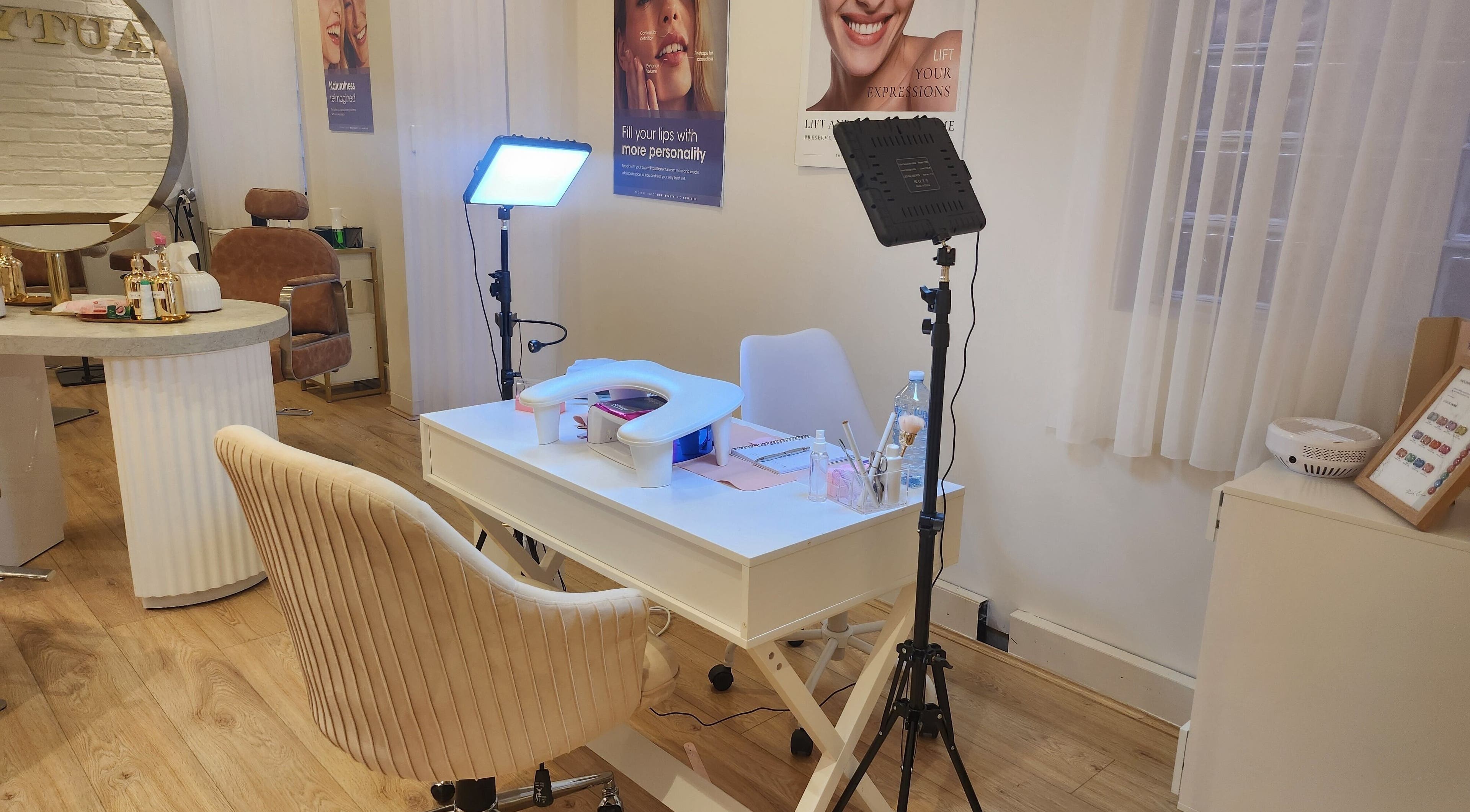 Modern manicure station at Nail Strike, Lane Cove, New South Wales, AU, featuring ambient lighting and plush seating.