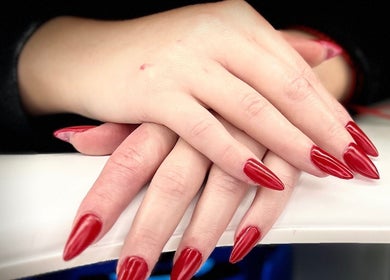 Close-up of elegant red nails at Nail Strike, Lane Cove, New South Wales, AU.