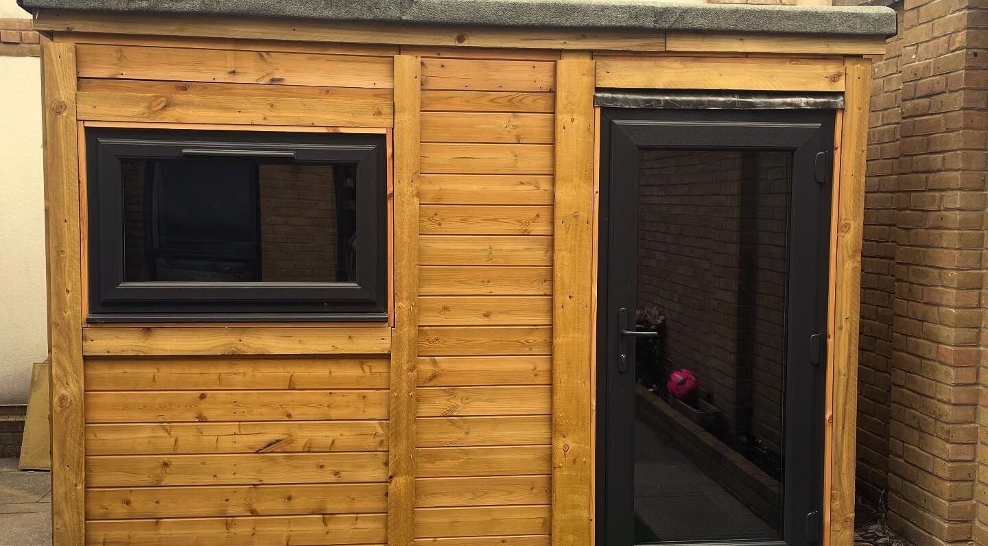 Wooden exterior of Lillie Rose Beauty's cozy venue in Worthing, England, GB.