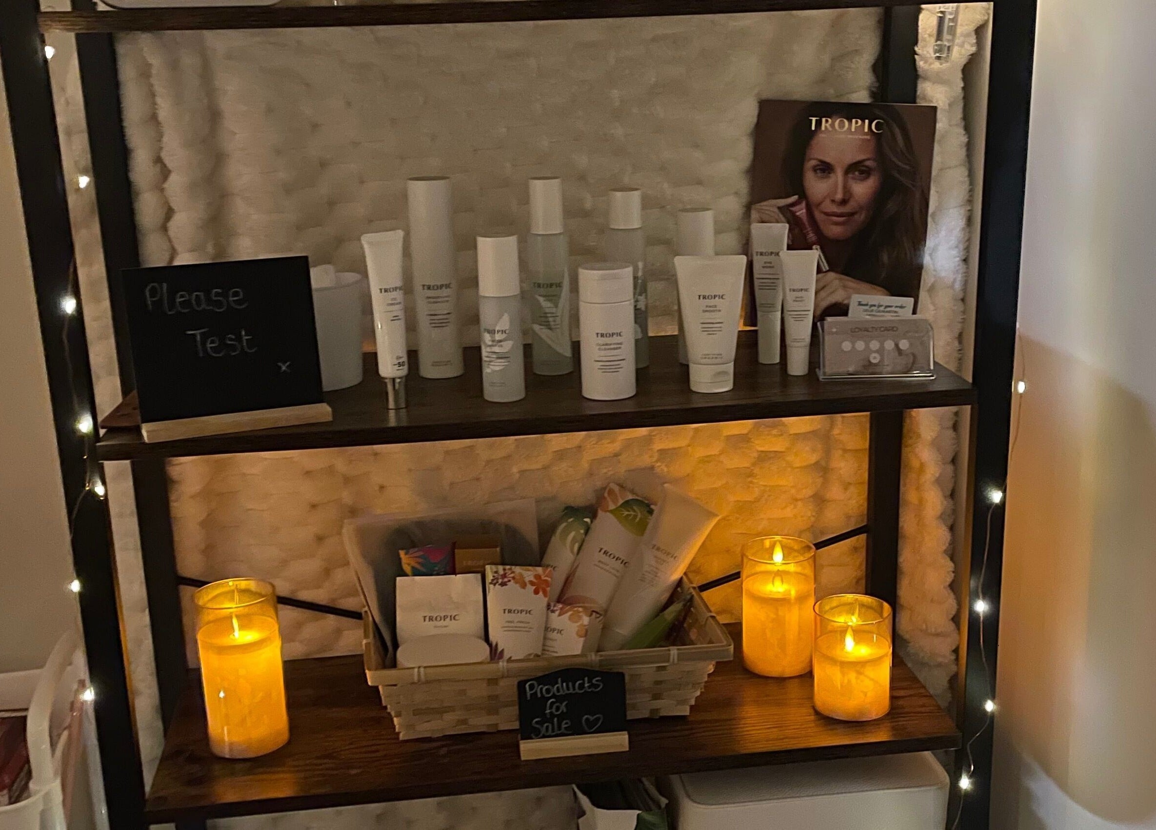 Lillie Rose Beauty shelf with skincare products and candles in Worthing, England, GB.