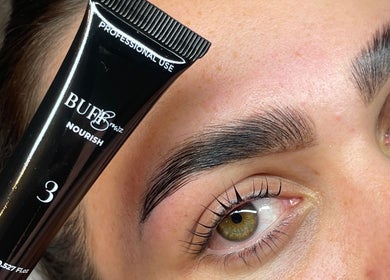 Close-up of well-groomed eyebrows at Lami Lounge UK, Spalding, England, GB, featuring a nourishing product.