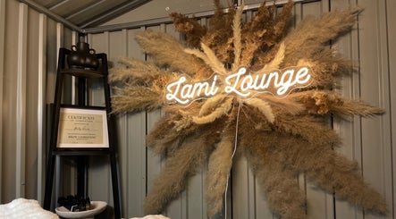 Neon Lami Lounge UK sign in Spalding, England venue with pampas grass decor.