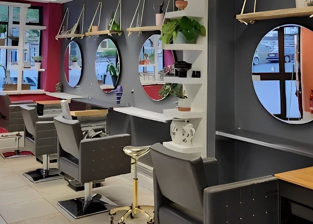 Modern salon chairs and mirrors at Tamed and Wild Fishponds, Bristol, England, GB.