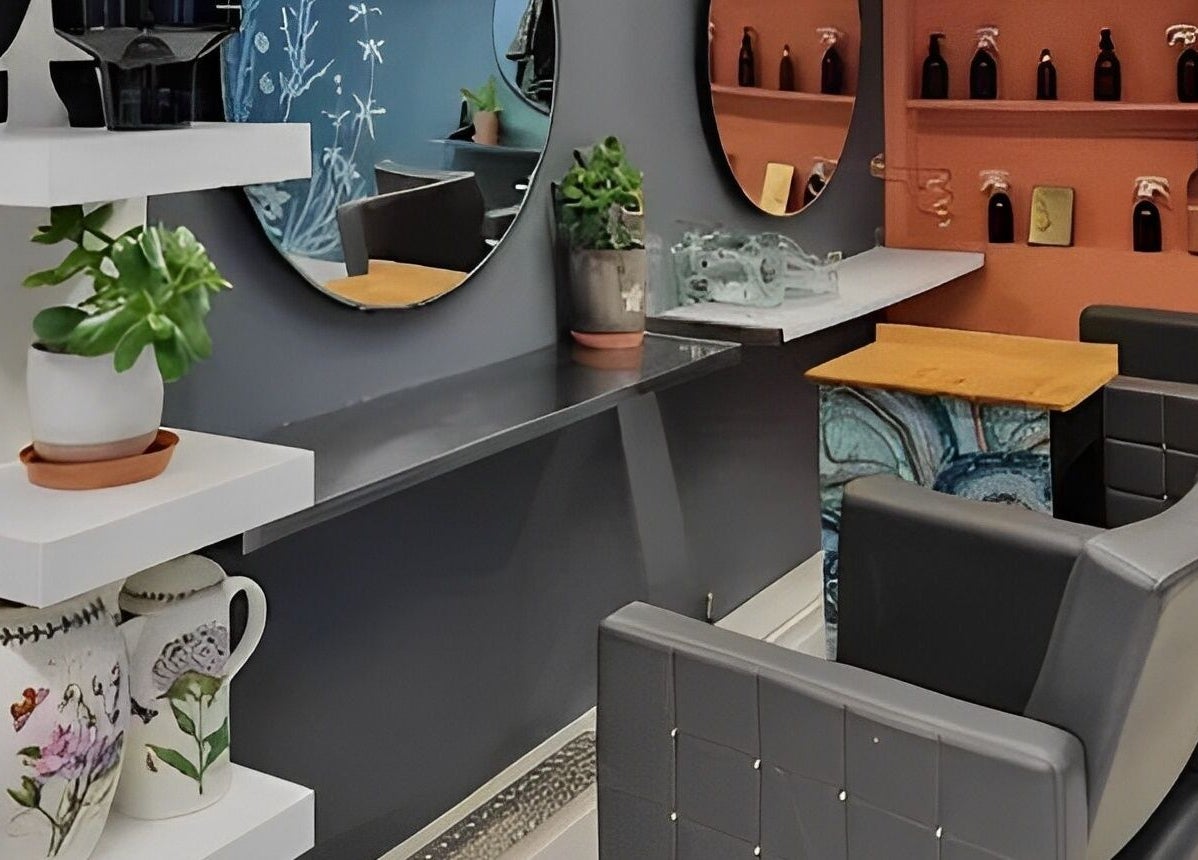 Contemporary salon interior with stylish chairs at Tamed and Wild Fishponds, Bristol, England, GB.