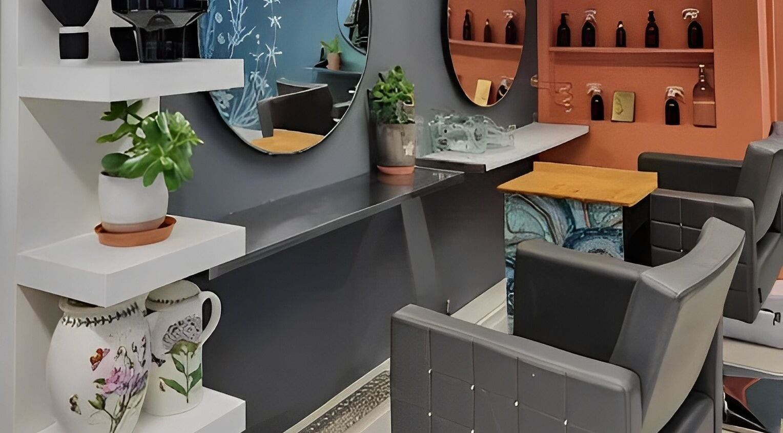 Contemporary salon interior with stylish chairs at Tamed and Wild Fishponds, Bristol, England, GB.