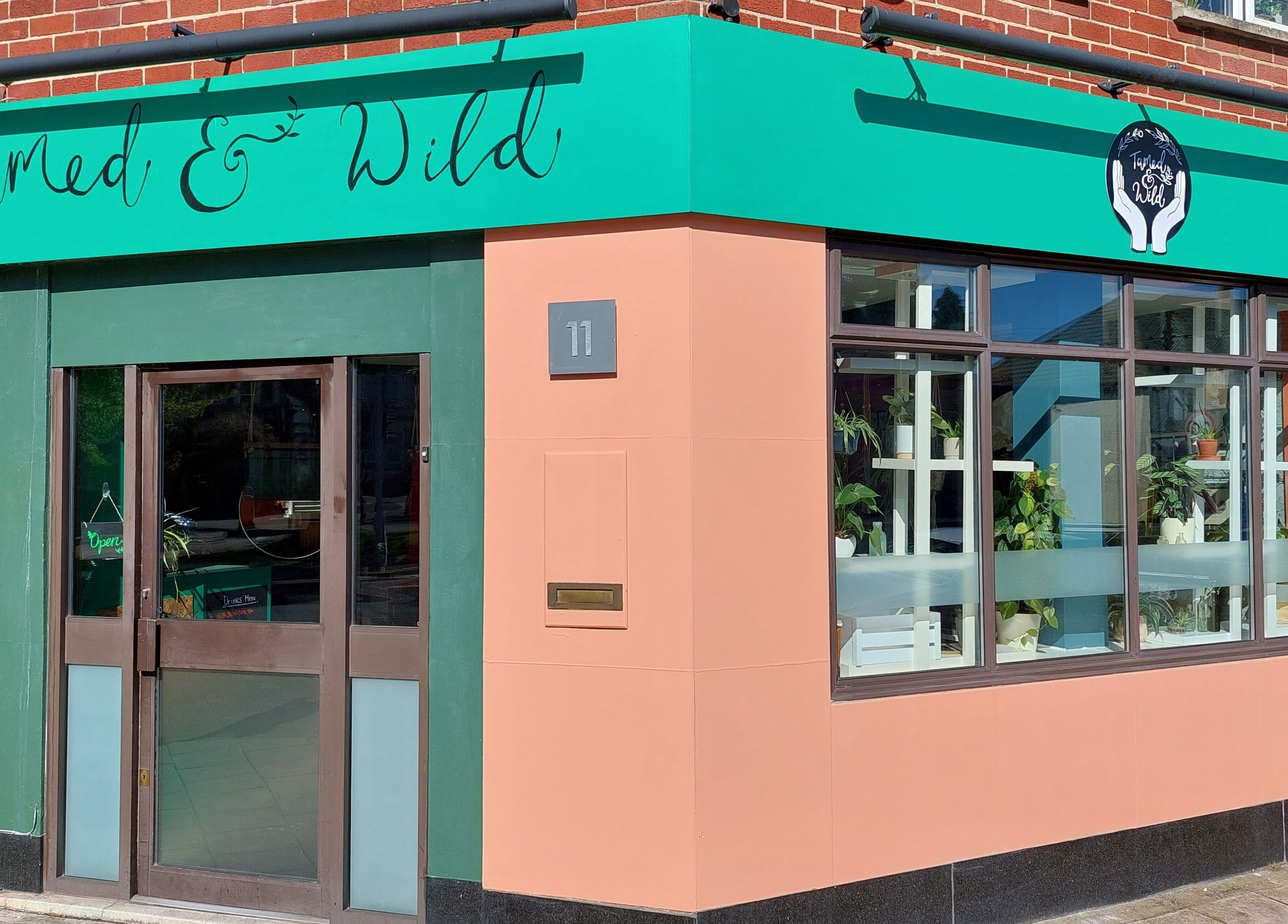 Front view of Tamed and Wild Fishponds in Bristol, England, GB showcasing its vibrant exterior design.