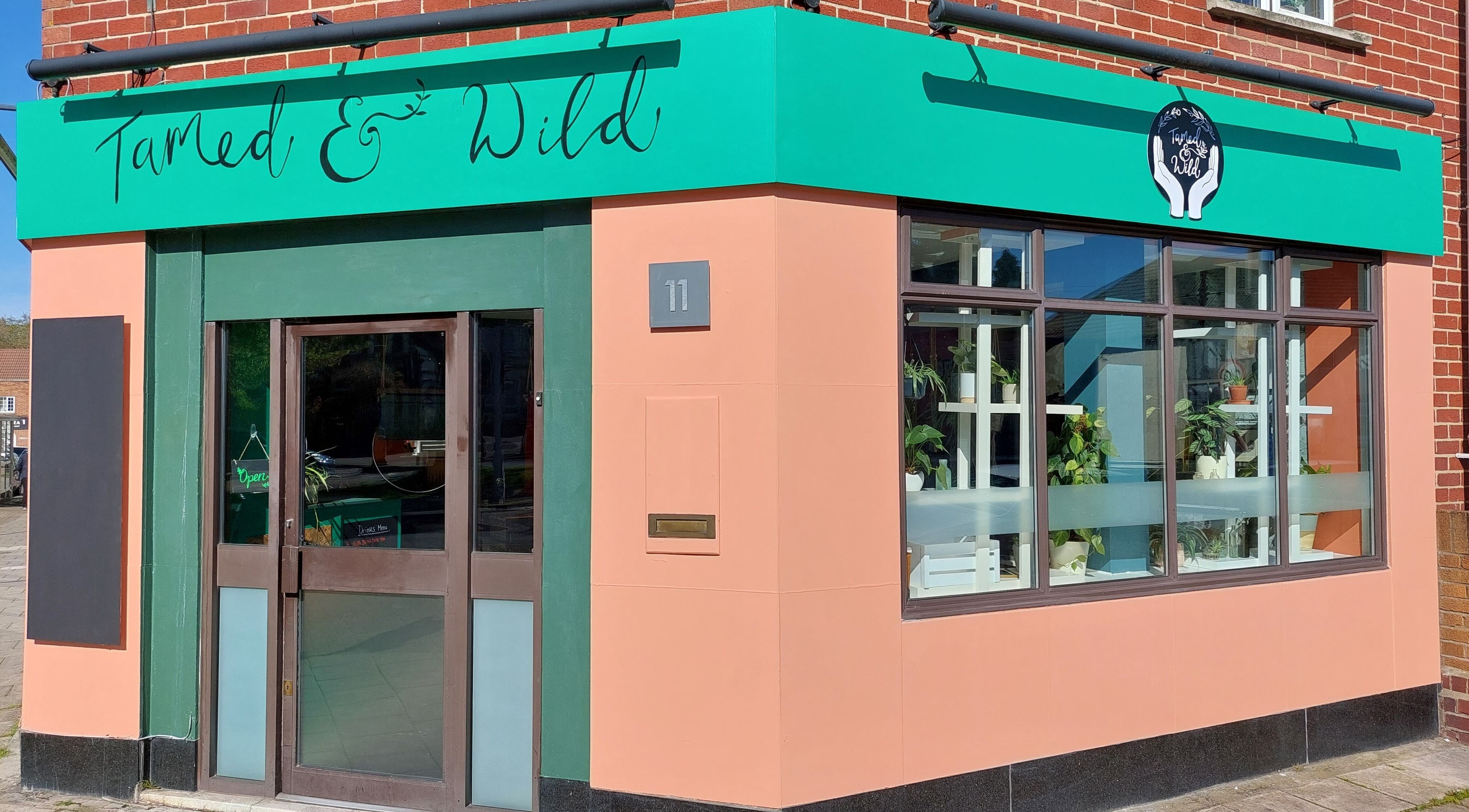 Front view of Tamed and Wild Fishponds in Bristol, England, GB showcasing its vibrant exterior design.