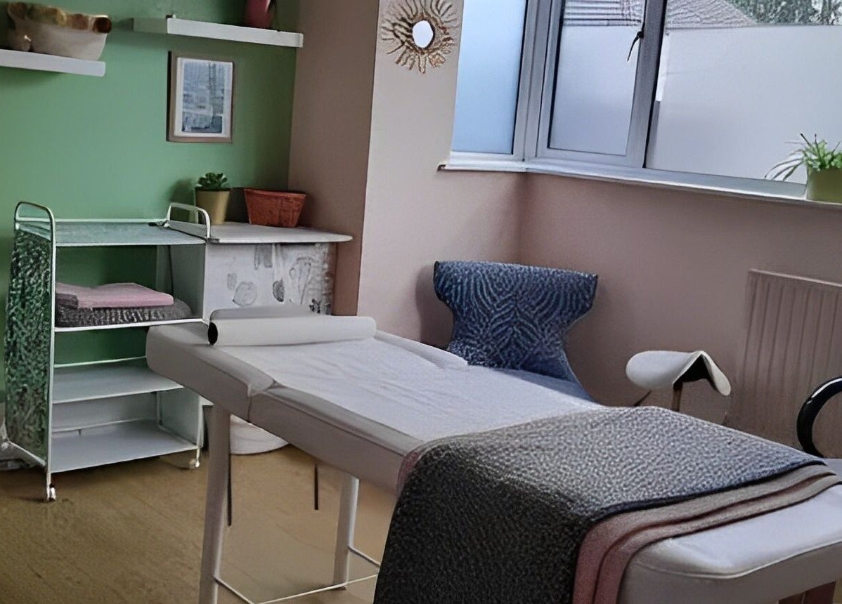 Tamed and Wild Fishponds treatment room with a massage table in Bristol, England, GB.