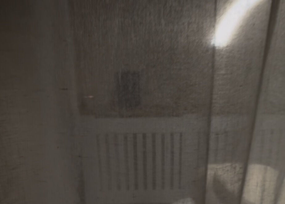 Cozy corner at Glow Up Lounge, Accrington, England, behind soft curtains, perfect for relaxation.