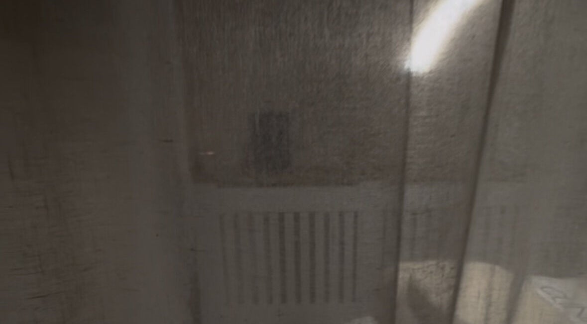 Cozy corner at Glow Up Lounge, Accrington, England, behind soft curtains, perfect for relaxation.