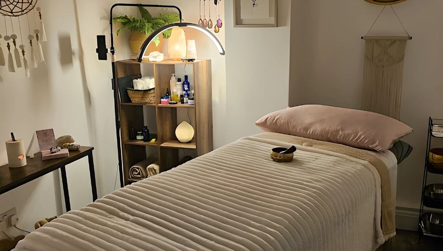 Relaxing massage room at Healing Hands Studio, Southampton, GB, offers a tranquil environment for wellness treatments.