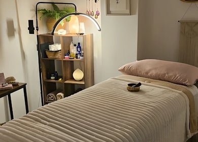 Relaxing massage room at Healing Hands Studio, Southampton, GB, offers a tranquil environment for wellness treatments.
