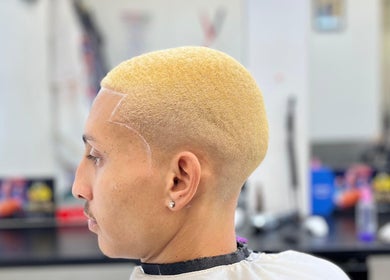 Trendy blonde buzz cut at Nana Rulz in Cape Town, Western Cape, ZA. Modern hairstyles for all occasions.