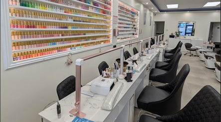 Elegant nail stations at Viet Nails and Beauty, Dublin, County Dublin, IE, with colorful polish display.