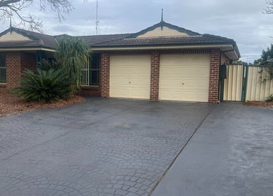 R.G Motion Therapy's charming brick exterior in Claremont Meadows, New South Wales, AU welcomes you inside.