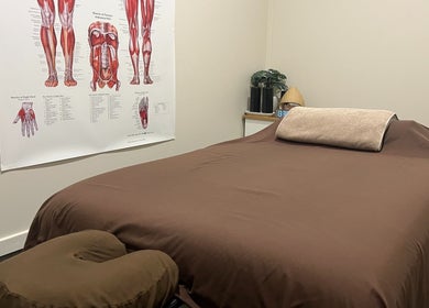 Comfortable treatment room at R.G Motion Therapy, Claremont Meadows, New South Wales, AU featuring a massage table.