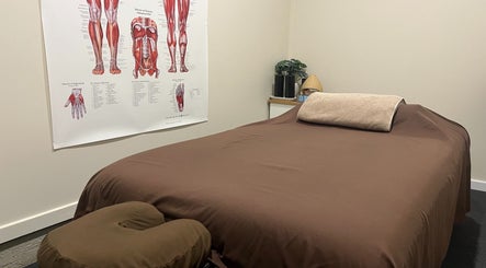 Comfortable treatment room at R.G Motion Therapy, Claremont Meadows, New South Wales, AU featuring a massage table.