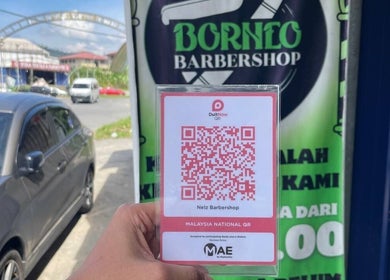 Borneo Barbershop Sabindo QR code in Penampang, Sabah, MY, inviting cashless payments.