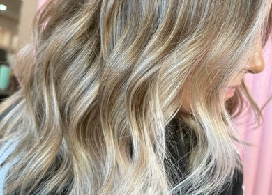 Stylish blond waves at Growth Salon, Fadden, Australian Capital Territory, AU. Elegance in hair artistry.
