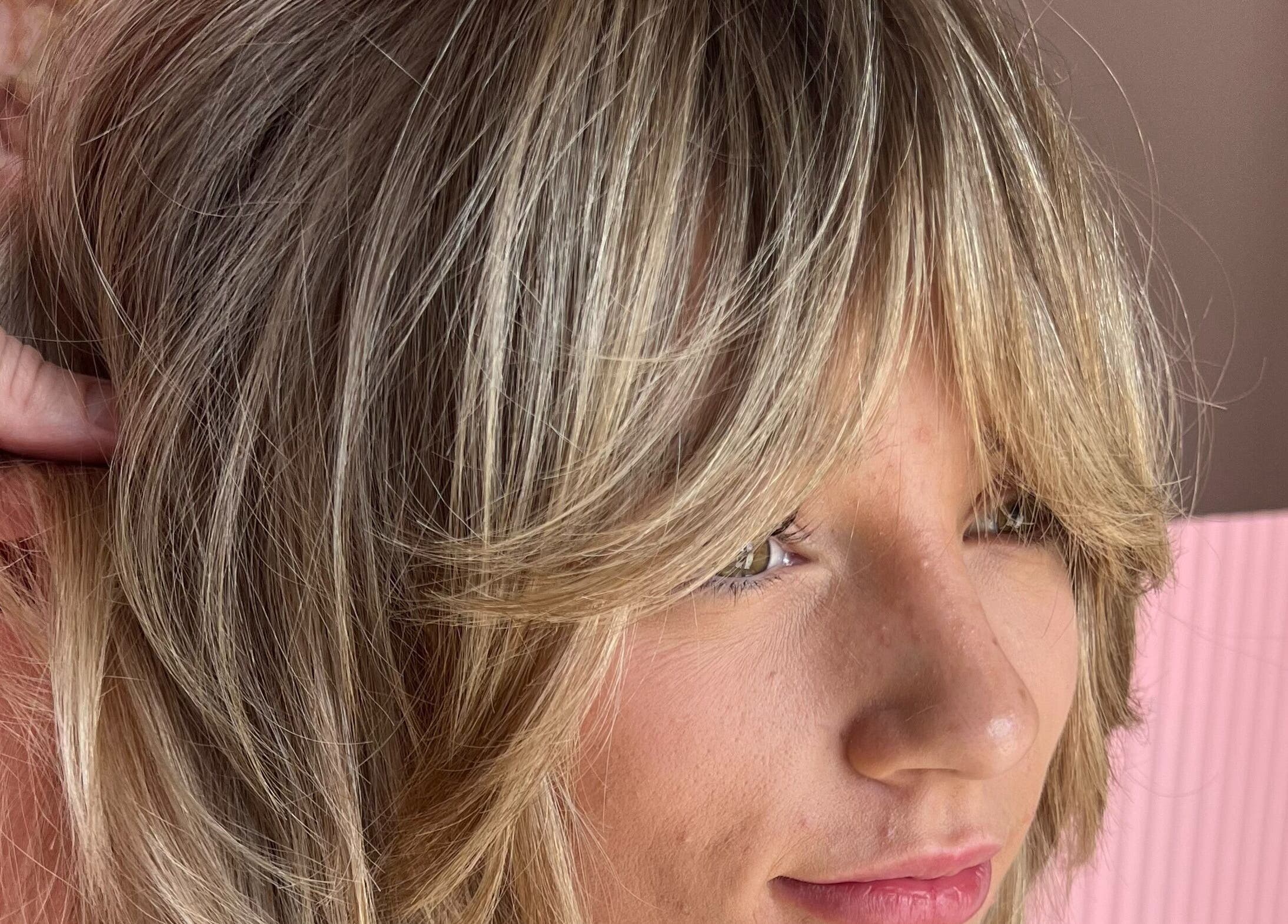 Blonde hair with layered fringe styled at Growth Salon, Fadden, Australian Capital Territory, AU.