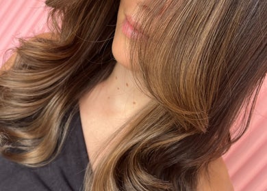 Stylish wavy brown hair at Growth Salon, Fadden, Australian Capital Territory, AU.