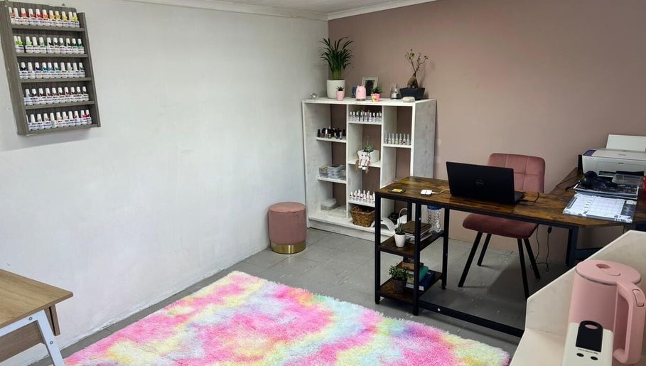 Chic and colorful nail salon interior at That Girl Tracy in Cape Town, Western Cape, ZA, featuring pastel decor.