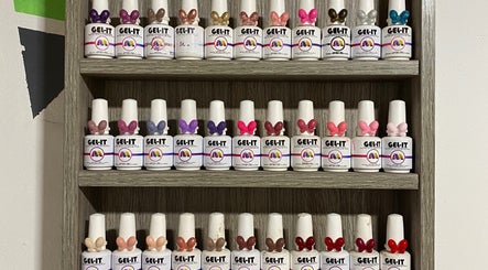 Diverse nail polish collection at That Girl Tracy, Cape Town, Western Cape, ZA, showcasing vibrant beauty products.
