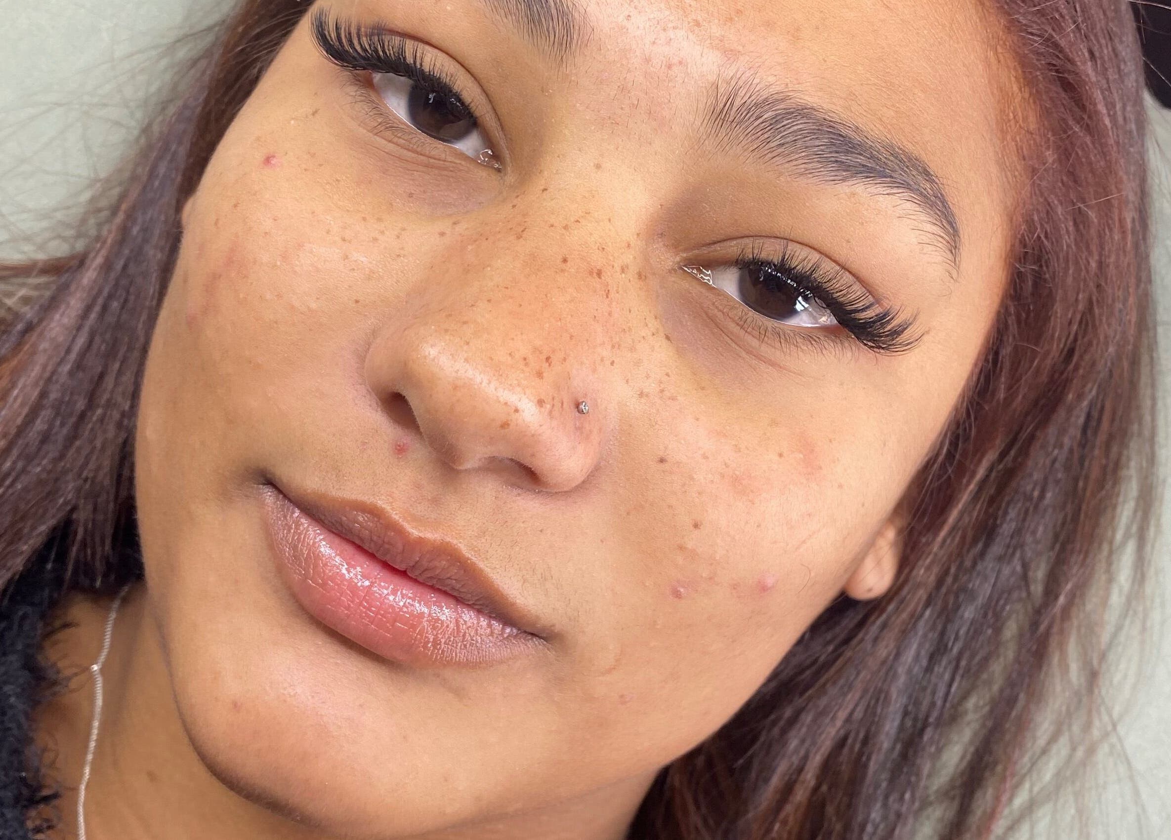 Close-up of a woman with expertly done lashes at Lashed by CD, Cape Town, Western Cape, ZA.