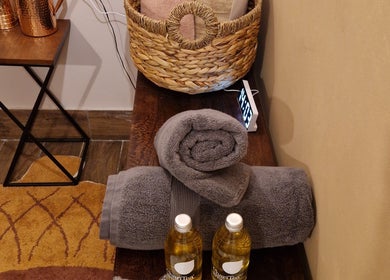 Luxurious spa essentials at The Three Elements - Day Spa & Detox, London, England, GB, featuring plush towels.