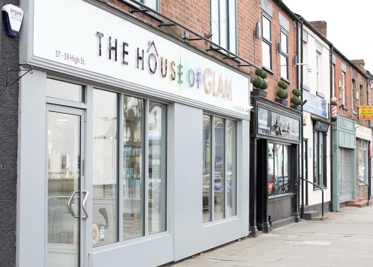 The House of Glam entrance on High St, Newton-le-Willows, England, GB, showcasing modern style.